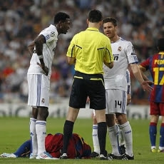A Barcelona player crying in front of Adebayor