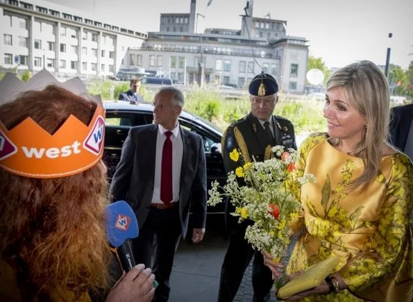 Queen Maxima opens the first anniversary congress of the Pension Federation. Queen Maxima wore Natan dress, Natan yellow Pumps