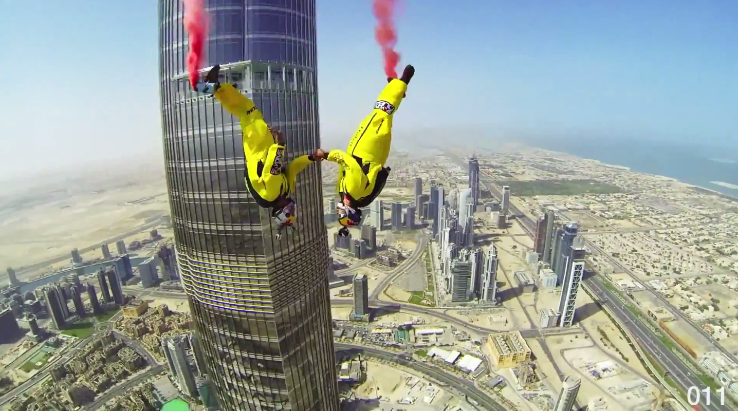 Реклама на бурдж халифа. Прыжок с Бурдж Халифа. Дубай прыжок с небоскреба. Самый высокий Base jumping. Бурдж Халифа 12 июня.
