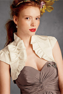http://www.adinasbridal.com/collections/cover-ups/products/bow-topped-bolero-ivory