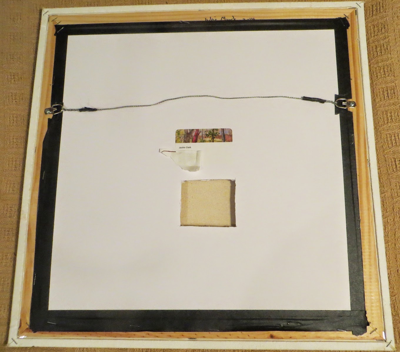 Jackie Clark Art Backing a Canvas