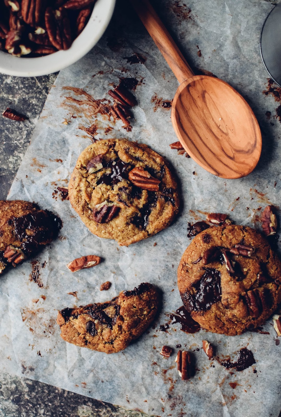 These chocolate chip cookies use ground pecans and coconut in the flour mixture and the darkest chocolate to give them a deep, sophisticated taste, this is a cookie for the adults. No kids allowed. Unless they've been really good...