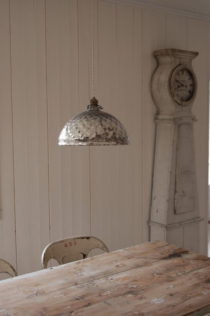 Modern country Swedish style dining room with rustic table and Mora clock - found on Hello Lovely Studio