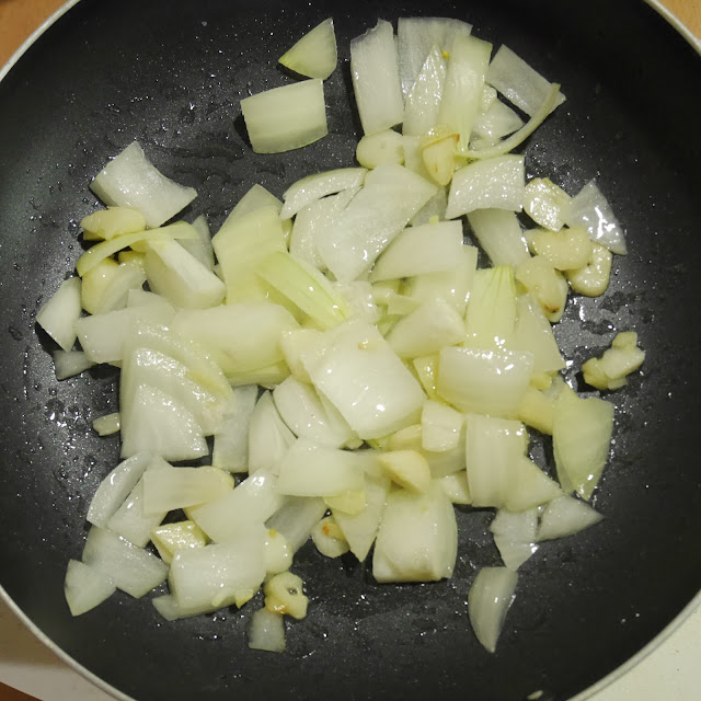 garlic and onions frying in oil