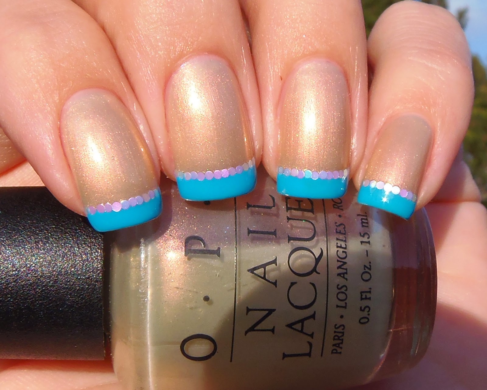 Sparkly Vernis: OPI Tahitian Twilight with blue tips... and my thoughts ...