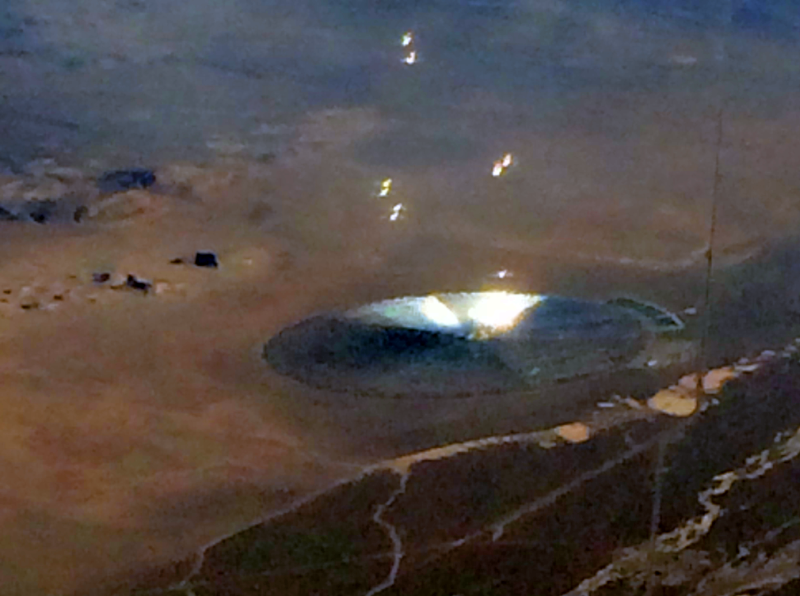 Unusual disc in desert Nevada throwing lights and object into the air