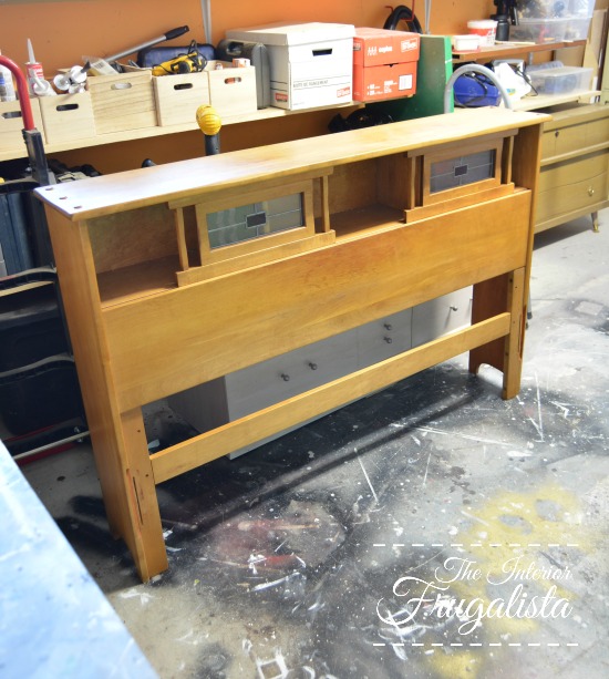 How to repurpose a vintage mid-century modern bookcase headboard with sliding doors into a small craftsman-style faux fireplace perfect for a rental.
