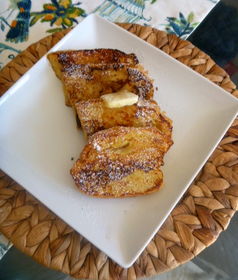 Country French Toast: Light and tender, fluffy thick pieces of country br bead fried to a golden brown, and smothered in real maple syrup - Slice of Southern