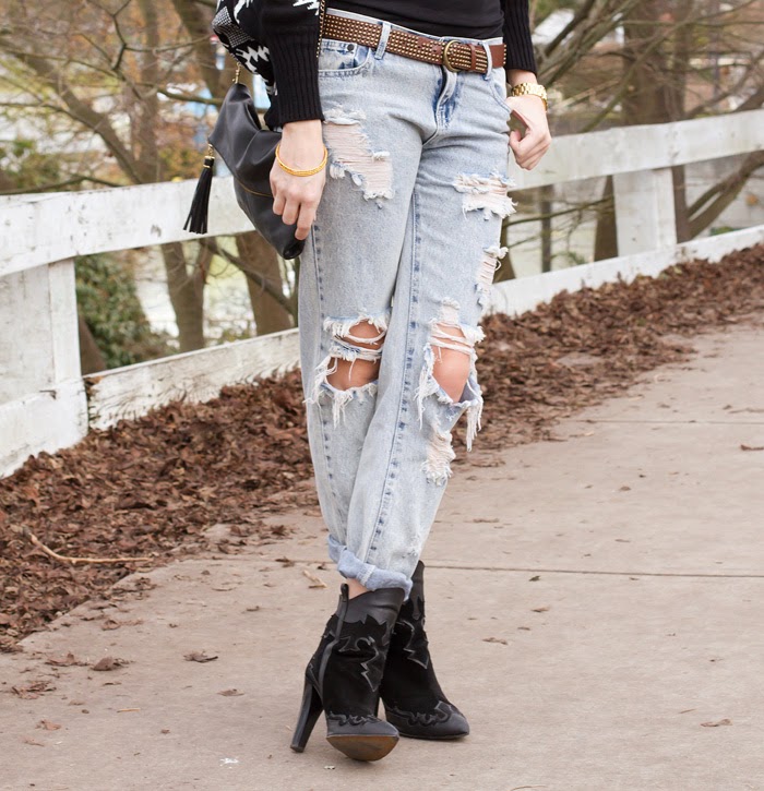 Vancouver Fashion Blogger, Alison Hutchinson, is wearing a Chicnova geometyric sweater, american apparel top, one teaspoon awesome baggies, zara western inspired boots, michael kors slim runway watch, and antropologie necklace and bracelets