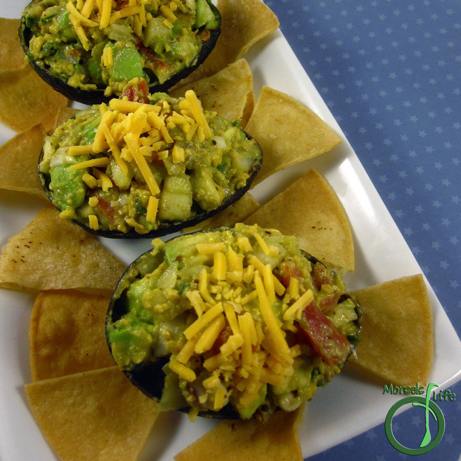 Morsels of Life - Cheesy Guacamole - Combine guacamole with cheese for a synergistically flavorful cheesy guacamole.