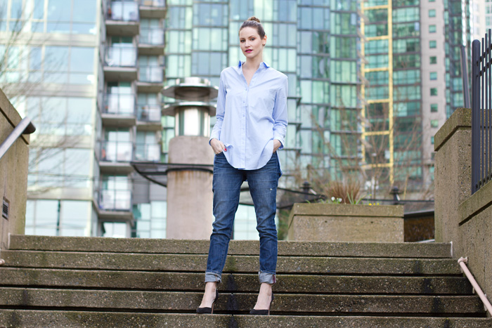 Vancouver Fashion Blogger, Alison Hutchinson, is wearing an H&M oversized light blue botton-up, Rich & Skinny boyfriend jeans and Zara black pumps