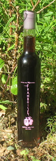 A bottle of Inspire Moore's raspberry framboise