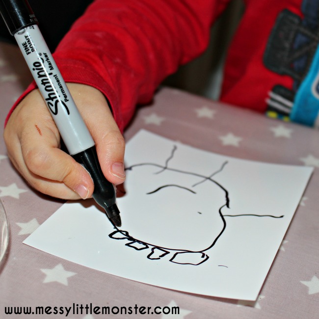 DIY shrinky dinks keyring using a child's first drawings 