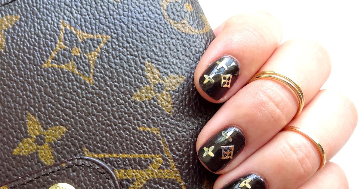 LV galore. Nails as an accessory. Stylish nails to match her wallet.