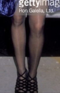 Karyn Parsons` Legs and Feet in Tights.