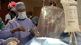 Surgeon performing Mitraclip heart procedure