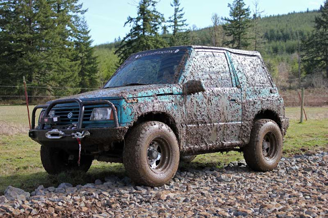 The Teal Terror in the mud at Mud Fest - Subcompact Culture