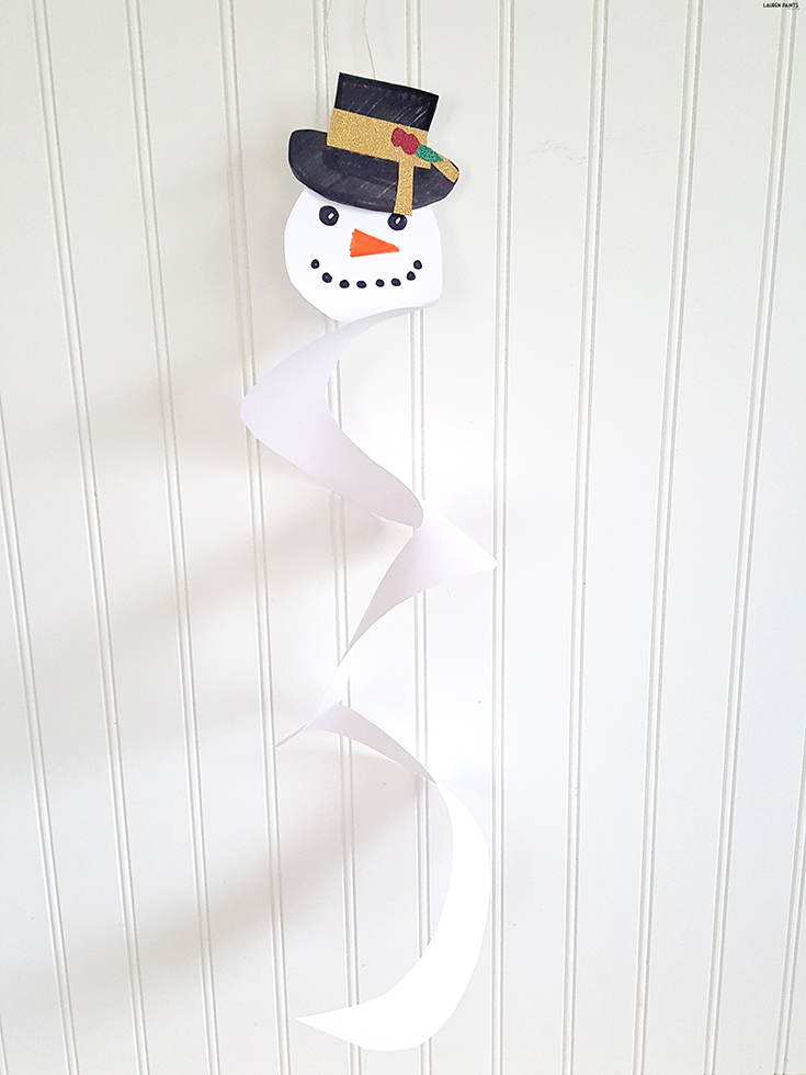 This little snowman is SO easy to build and the perfect indoor project if you are trying to avoid the cold... or reminiscing of cool weather memories.