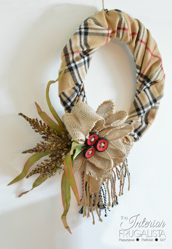 How to make a Fall Scarf Wreath using an inexpensive scarf, burlap ribbon, Fall floral picks, and buttons. Fall Scarf Wreath using a scarf, burlap and buttons