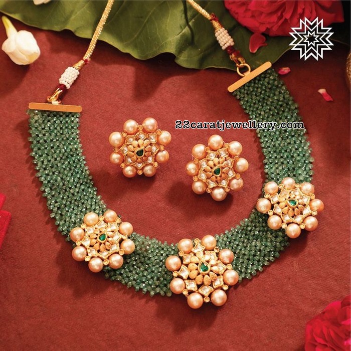 Crystal Jewellery with Pearls Flower Motifs Jewellery Designs