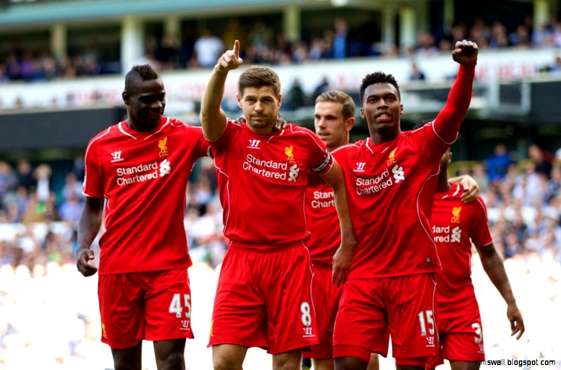 Steven Gerrard Of Liverpool Celebrates With Team Mates