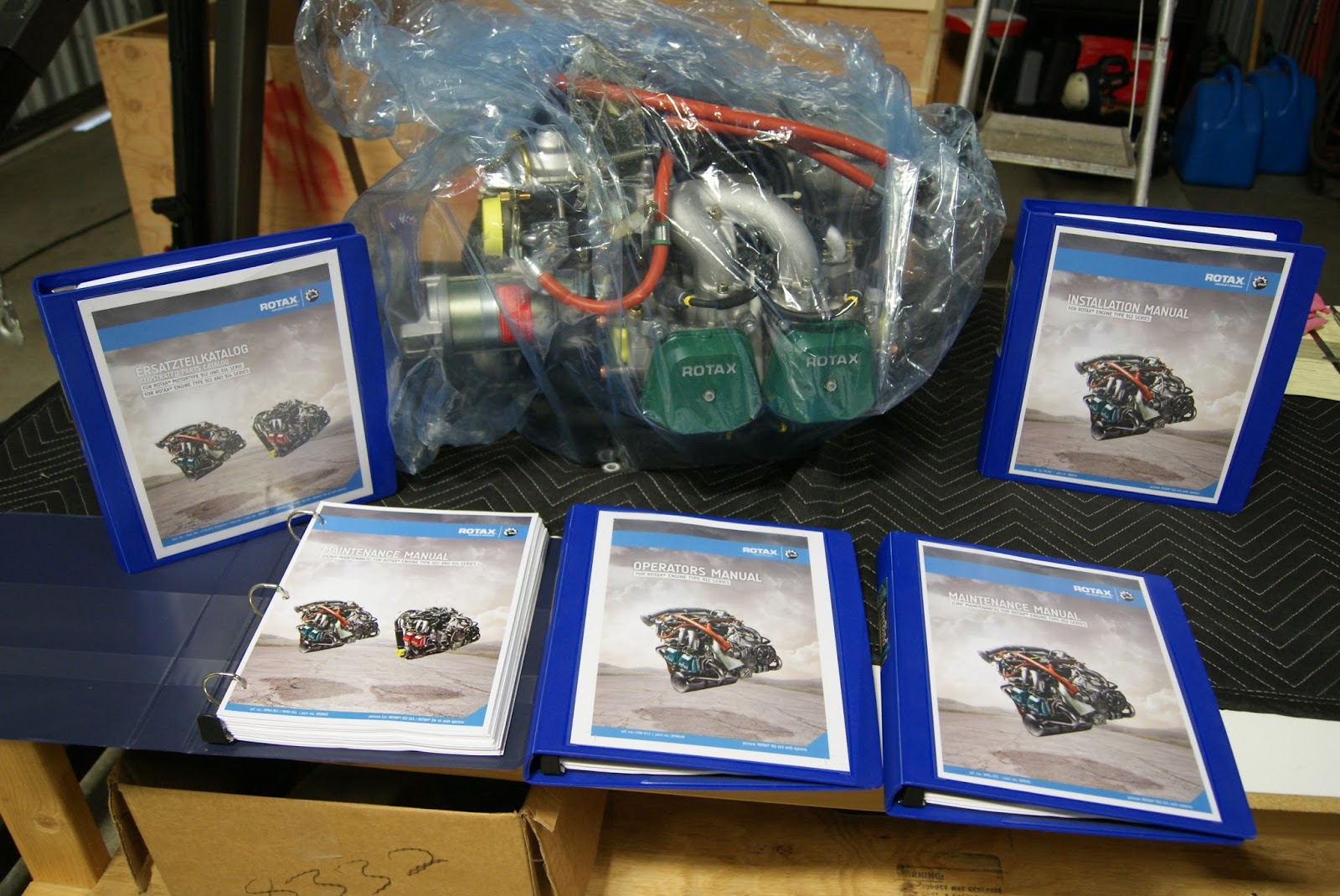 Rotax 912 ULS documentation from left to right … Illustrated Parts Catalog,  Heavy Maintenance Manual, Operators Manual, Line Maintenance Manual and ...