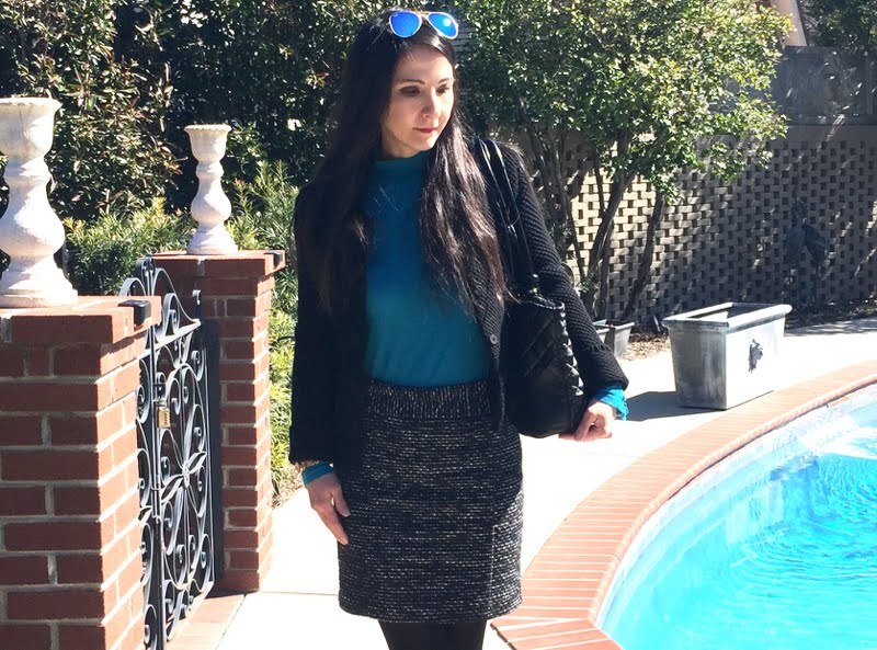 Winter blues outfit - 1/2 body Upper half body shot of winter blues outfit. Carrying large black purse.