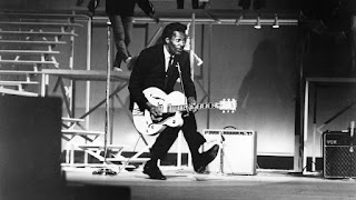 Chuck Berry doing his famous duck walk