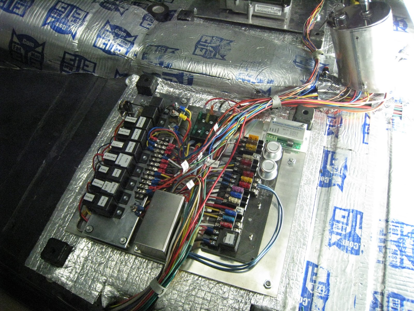 1937 Plymouth: Wiring pallets complete. Fuses and relays under drivers