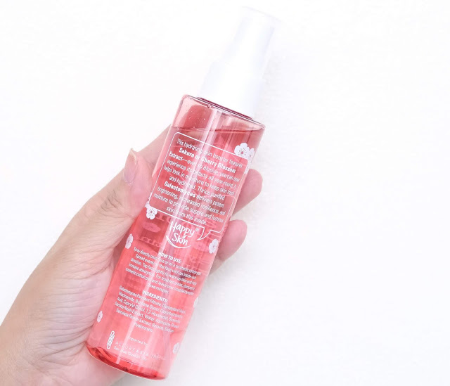 a photo of Happy Skin Beauty Sakura Bloom Hydrating Skin Booster review by Nikki Tiu www.askmewhats.com