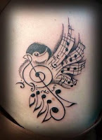 tatuaje de musica con pajaro y notas