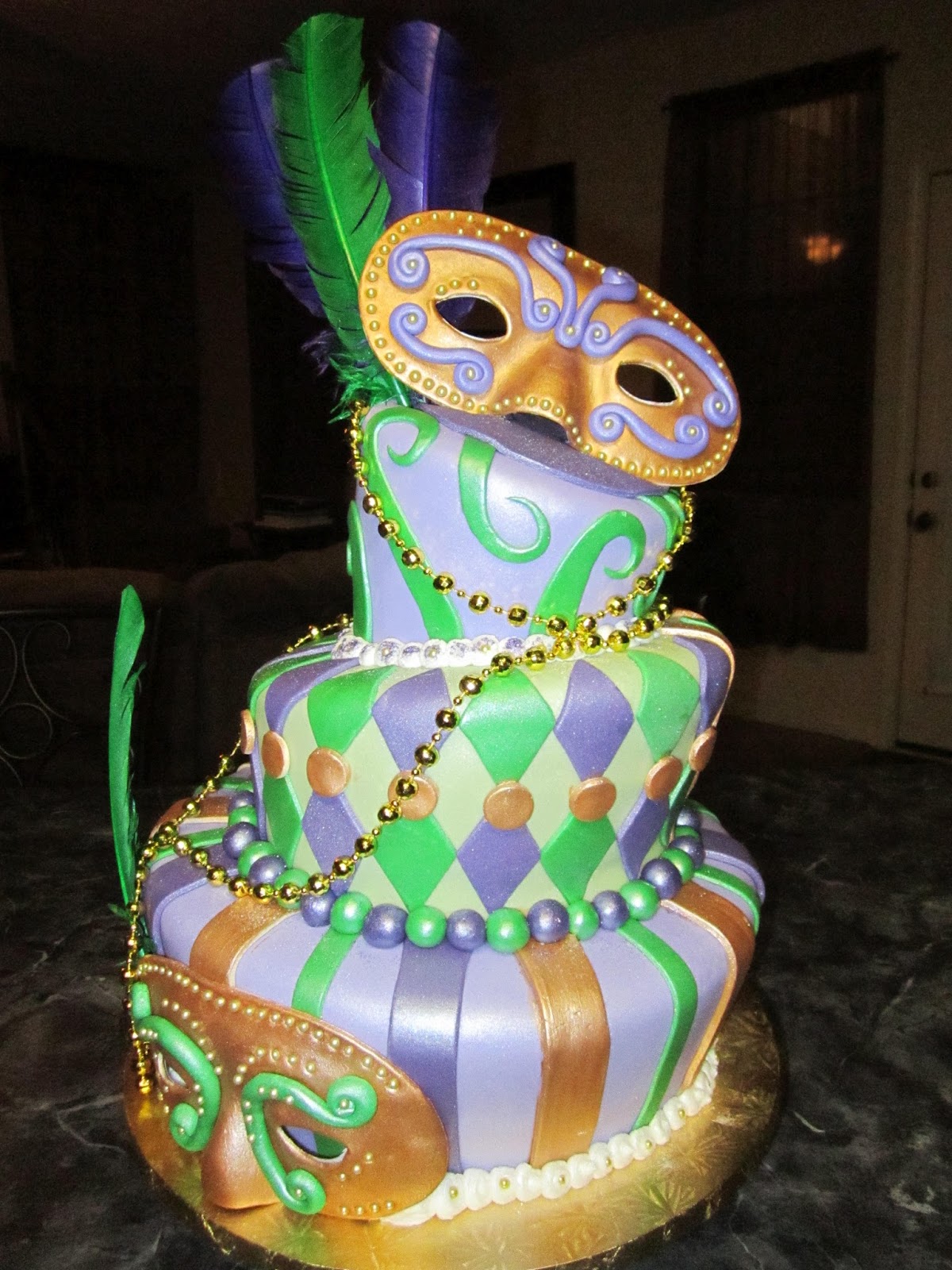MyMoniCakes Topsy Turvy Mardi Gras Face Mask Cake