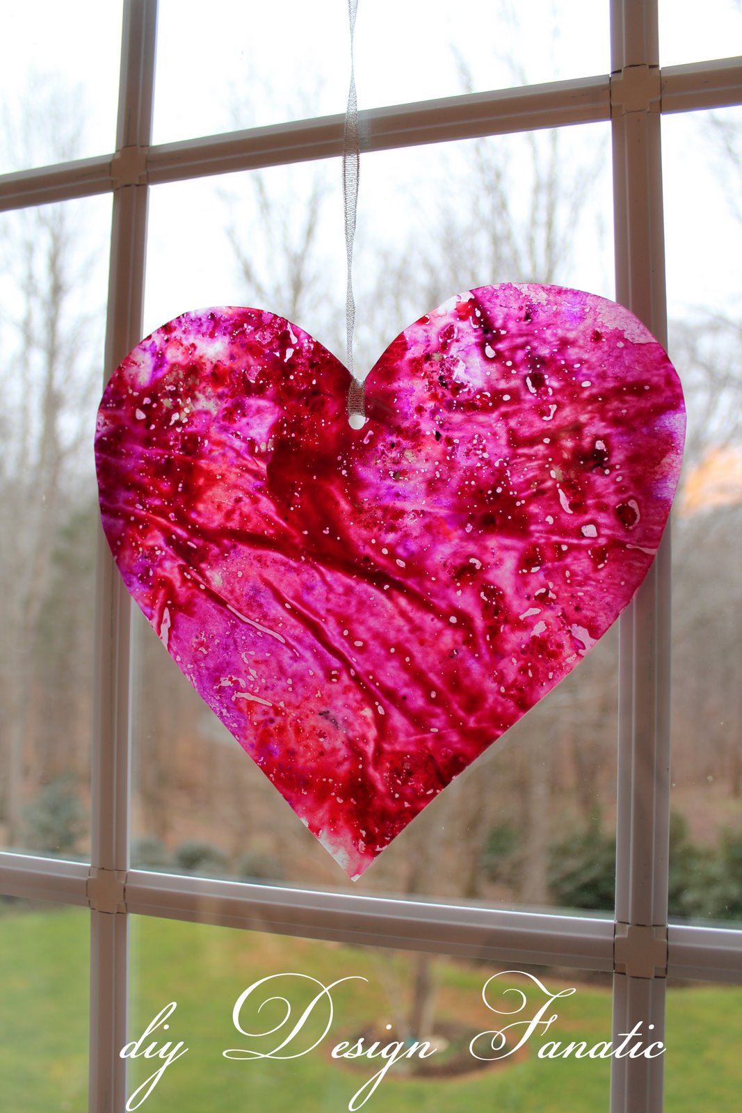 Little wax paper crayon hearts might be fun hanging from the chandelier