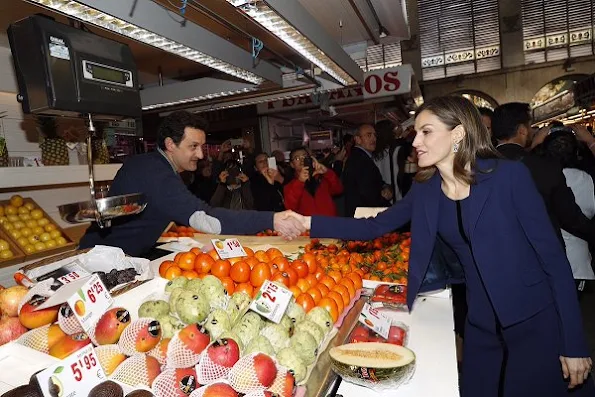 Queen Letizia wore Felipe Varela dress and coat, Felipe Varela clutch bag, Magrit Black Leather pumps, Bvlgari Aquamarine and Sapphire Gold Earrings