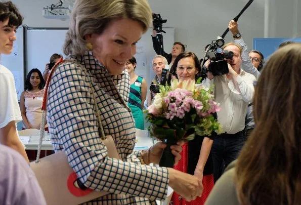 Queen Mathilde of Belgium visited the Maria Boodschap Lyceum, a catholic school for secondary education in Brussels for program Conflixers