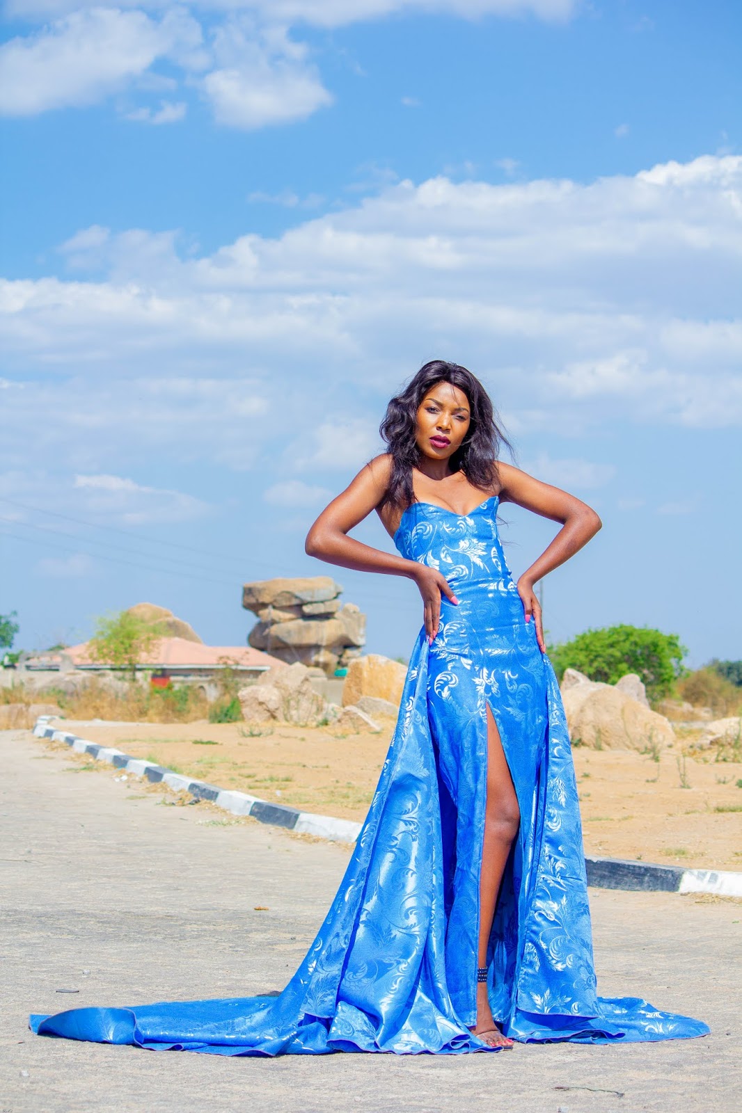 Tania Tatenda Aaron Poses For A Photoshoot with Blaq Studios In A Beautiful SkyBlue Dress