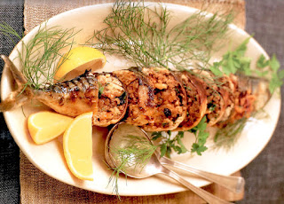 Mackerel stuffed with nuts and spices that's baked or fried to cook.