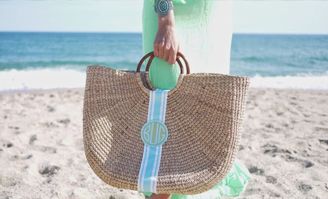 My favorite beach bag is this straw monogrammed ribbon bag from Buggy ...