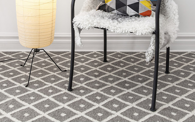 Gray patterned carpet is a neutral floor with a fun twist!