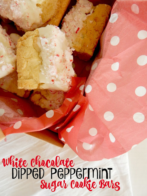 White Chocolate Dipped Peppermint Sugar Cookie Bars...a festive dessert for the holidays!  These peppermint sugar cookie bars taken up a notch dipped in white chocolate and sprinkled with crushed peppermints.  Perfect for your Christmas platter! (sweetandsavoryfood.com)