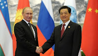 Vladimir Putin and Hu Jintao