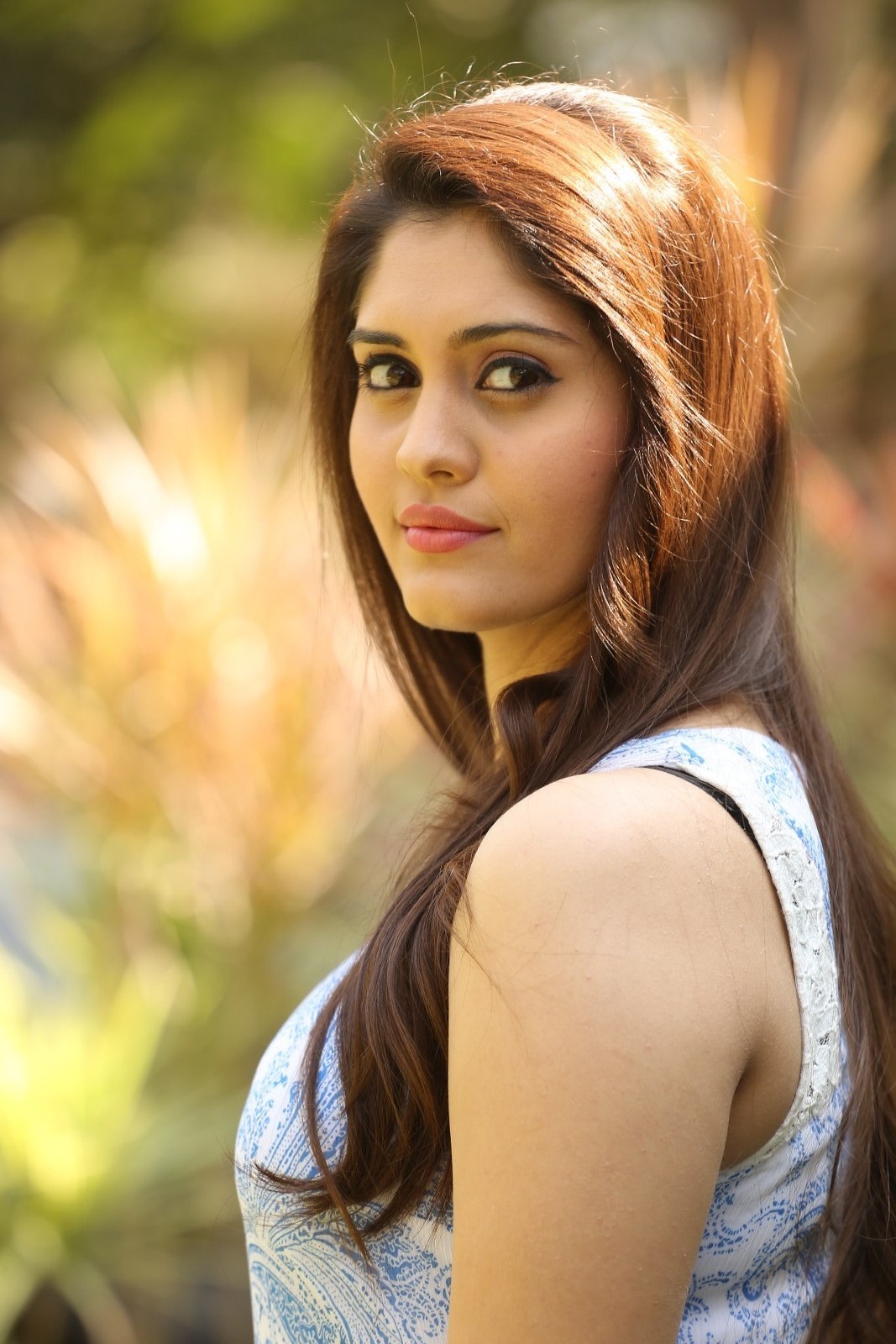 Actress Surabhi Latest Hot Photos In Blue Dress