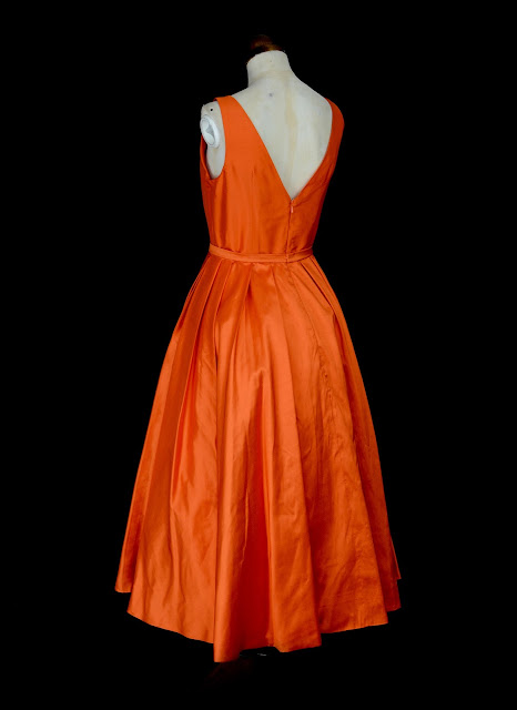 Orange silk dress by Alexandra King