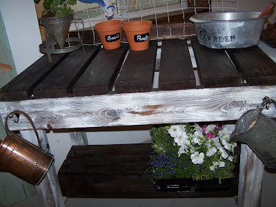 swing set scrap, salvaged wood potting bench http://bec4-beyondthepicketfence.blogspot.com/2011/06/from-playset-to-potting-table.html