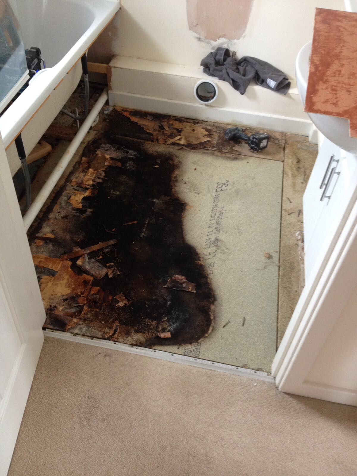 Bathroom floor. Repair carried out after discovering a bad leak then