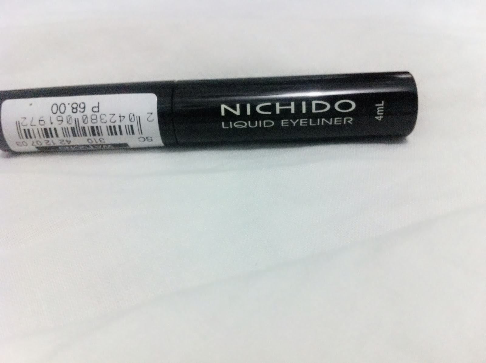 Walk in high heels with colored lips: Review: Nichido liquid eyeliner