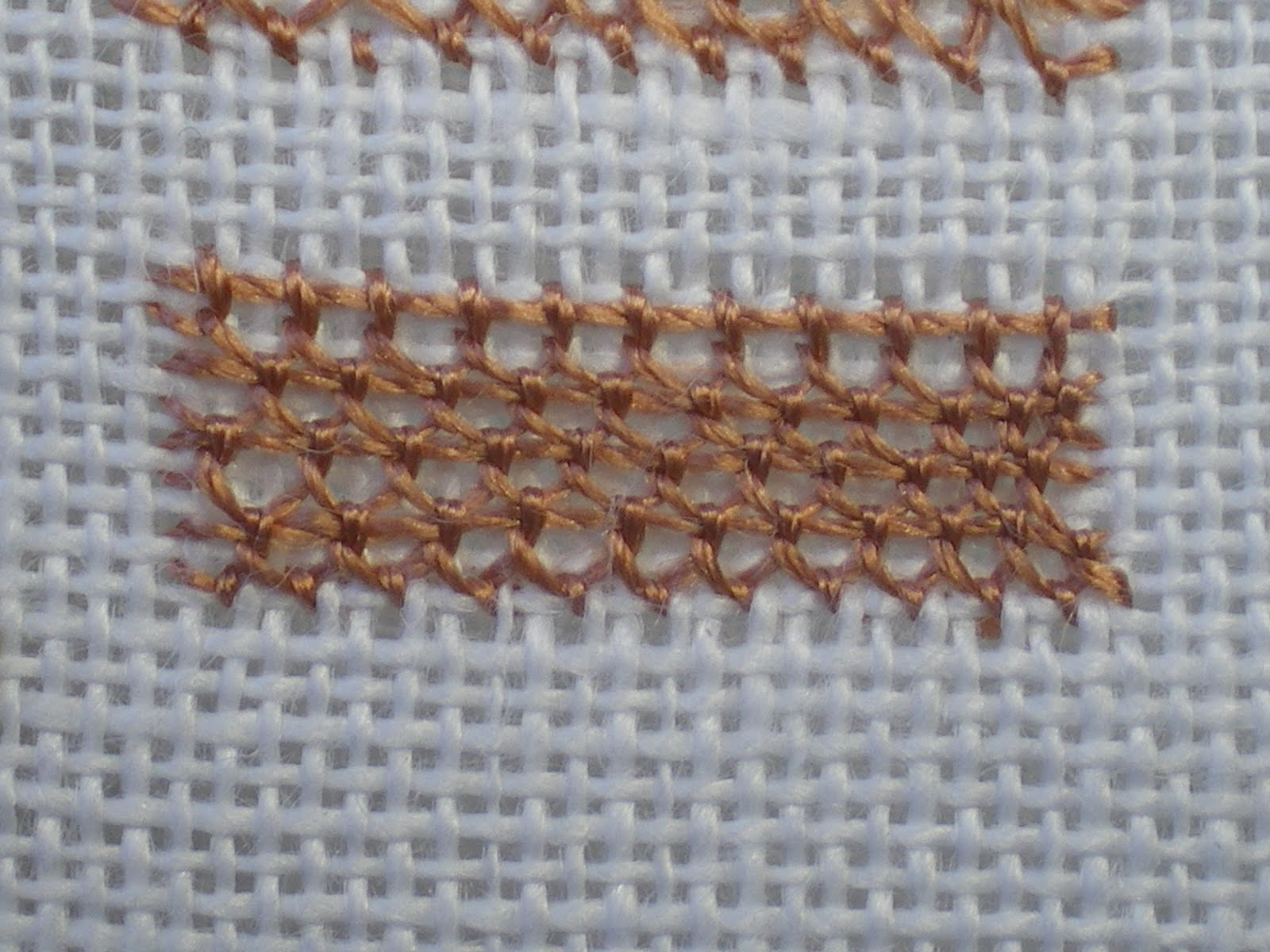 Threads Across the Web: Detached Buttonhole with Return Stitch