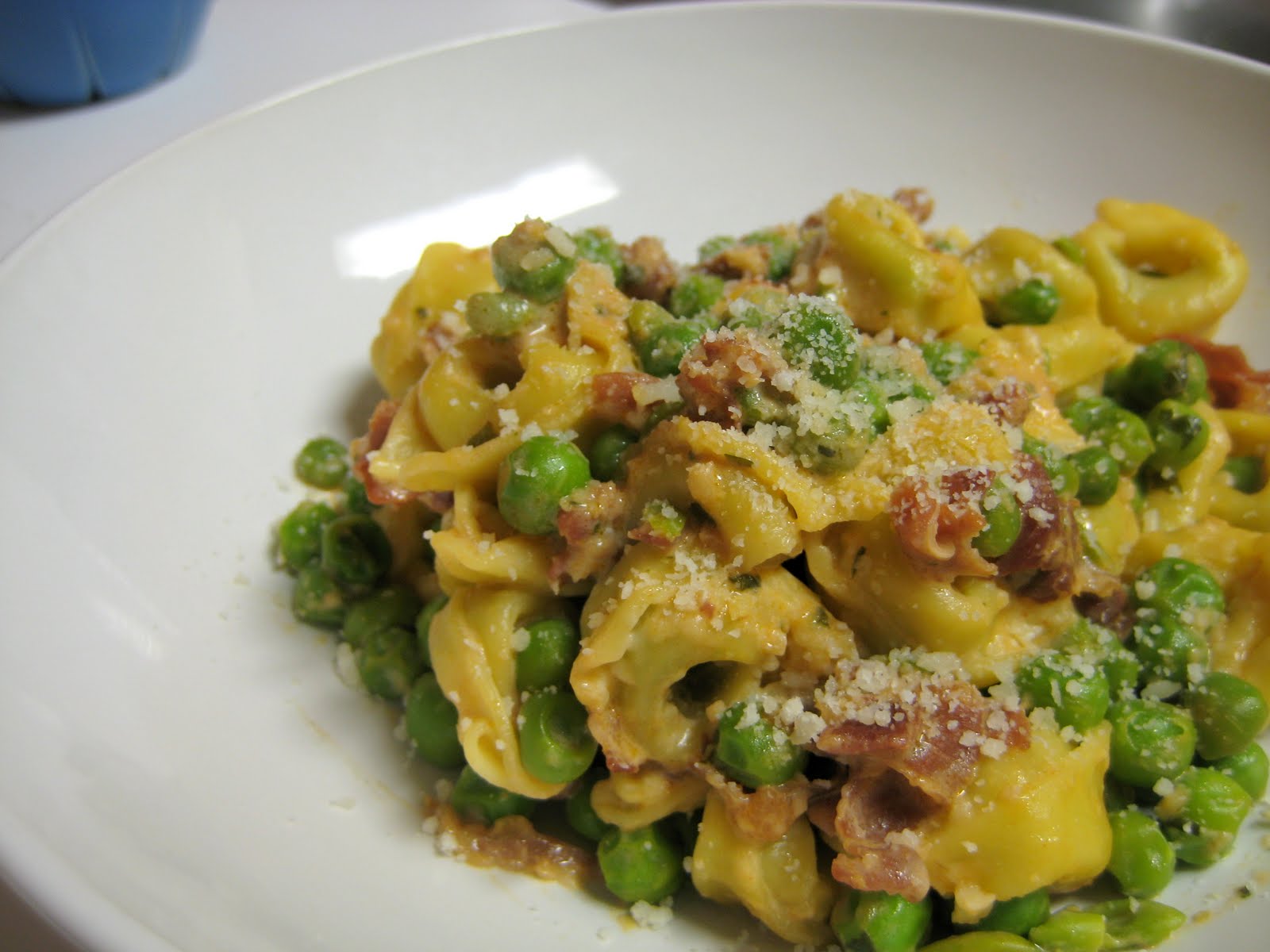Tart Reform Tortellini with Peas and Prosciutto