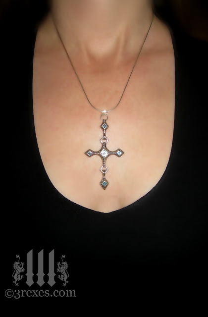 renaissance silver cross necklace with blue topaz short