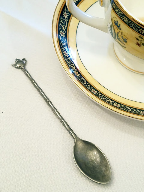 vintage tea spoon with teapot on the end